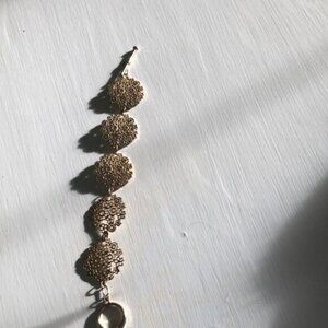 Laser cut style gold costume bracelet